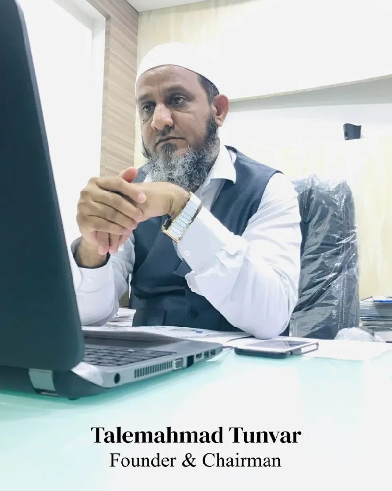 Talemahmad Tunvar, Founder & Chairman, N&T Group of Companies, at his desk in the NNT Software office